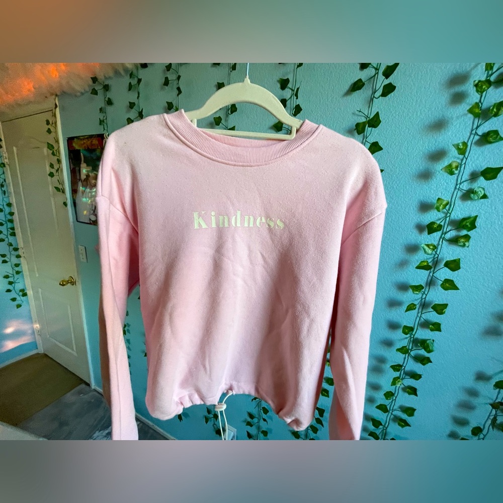 Pink sweater with adjustable drawstring